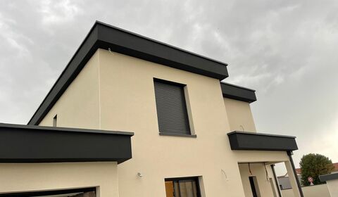 Enduit de façade, finition grattée (Roussillon)